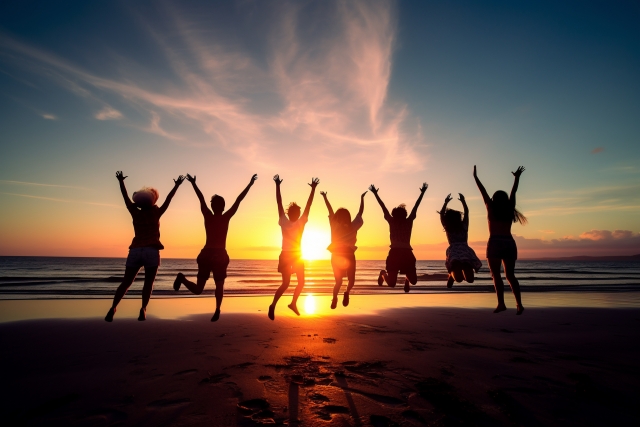 海岸でジャンプする人