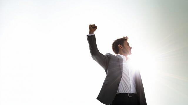 腕を上げるひと